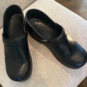 Dansko Black Leather Slip-On Clogs